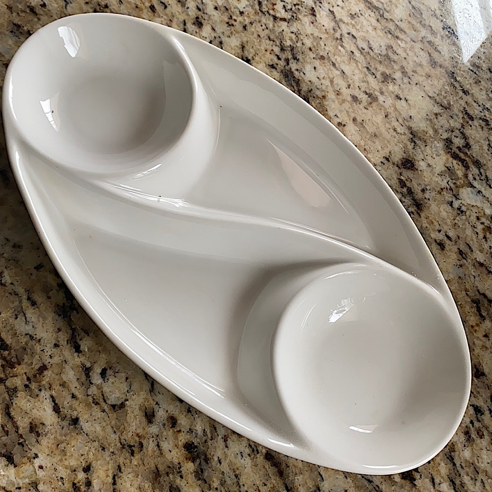 Medium sized serving platter with food section separators.